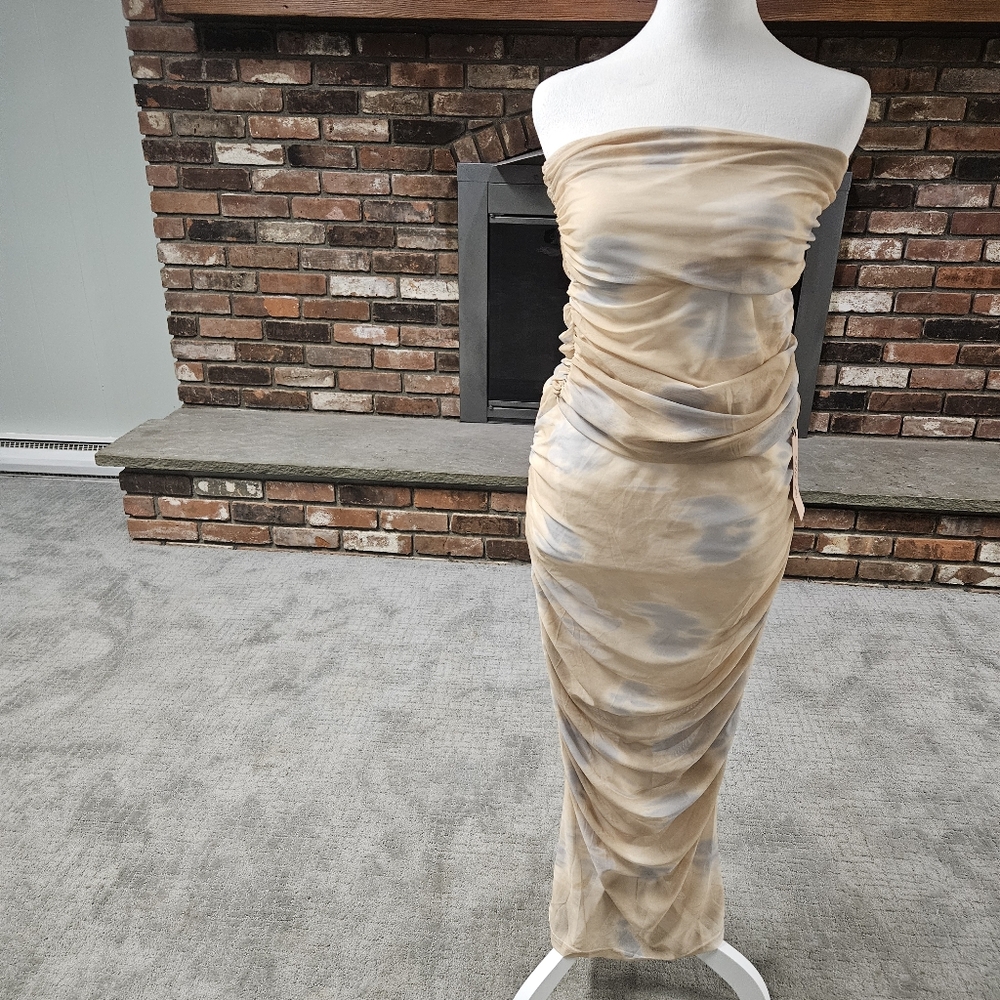 Two piece maxi skirt and matching tube top very sexy. Micas fashion gold